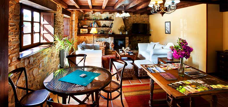 Sala de estar en Hotel Casa Cachón